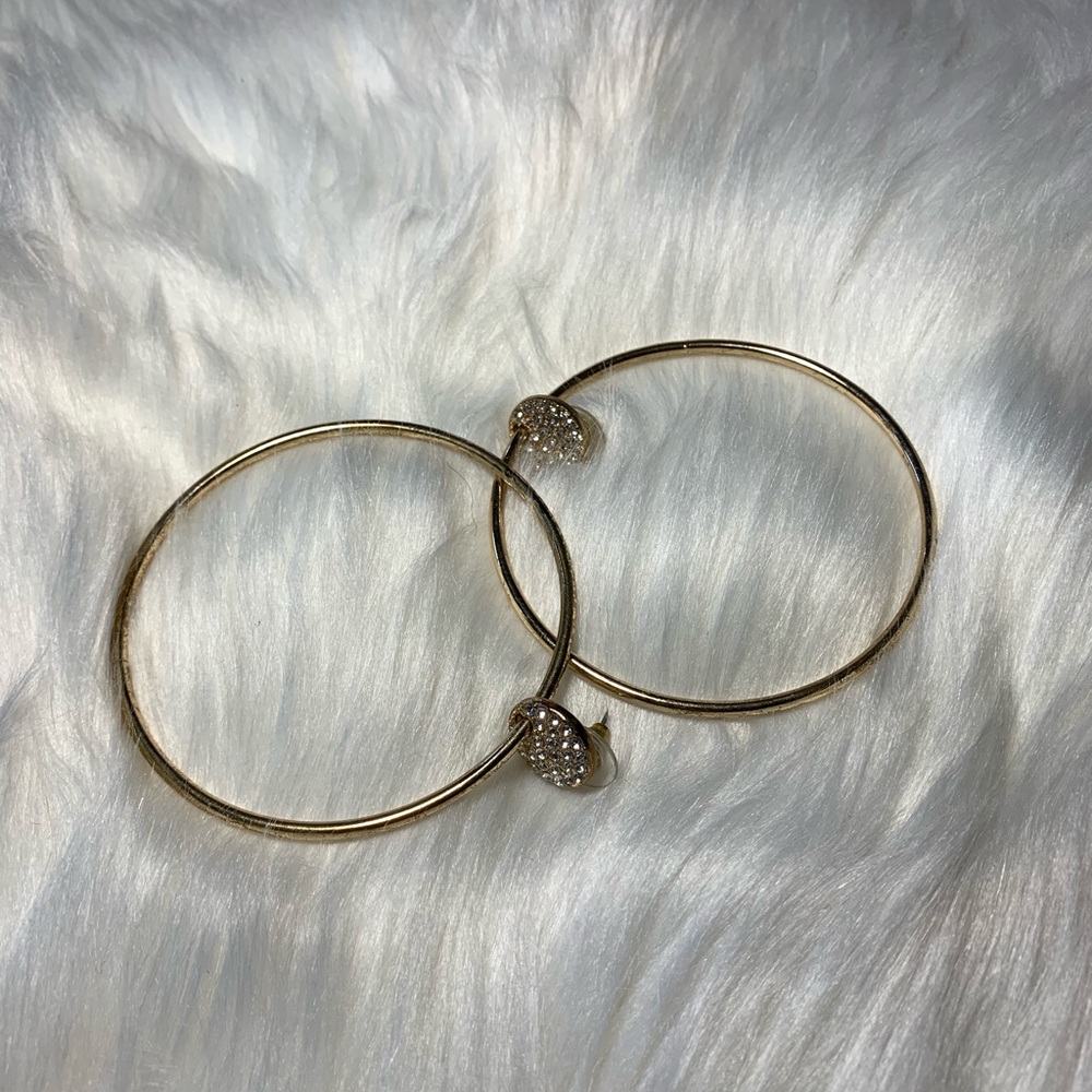 Gold hoops with earrings